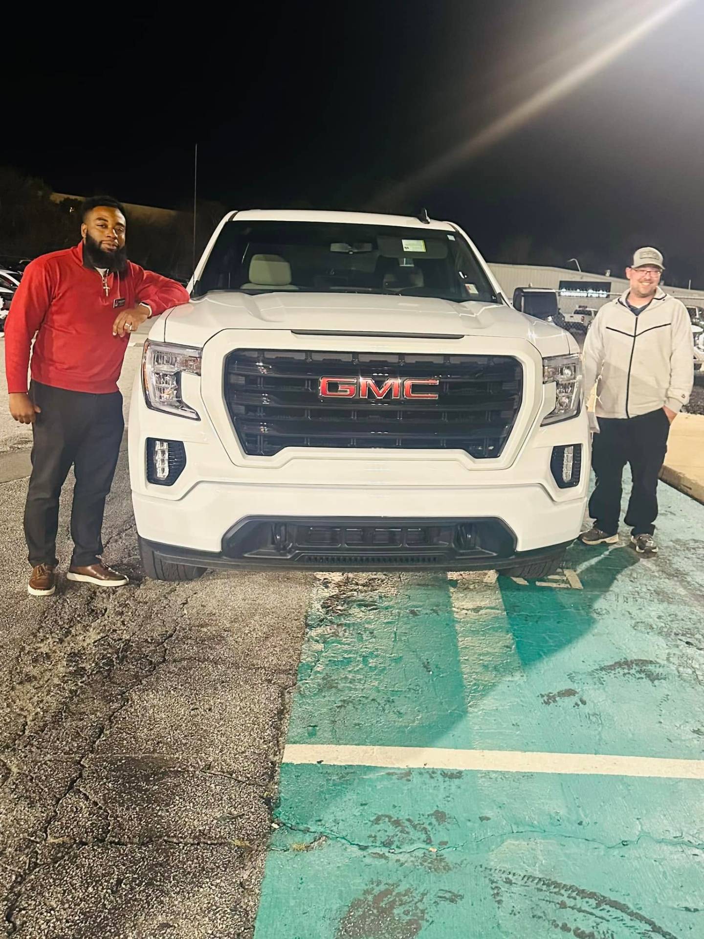 Happy customer with new GMC Sierra